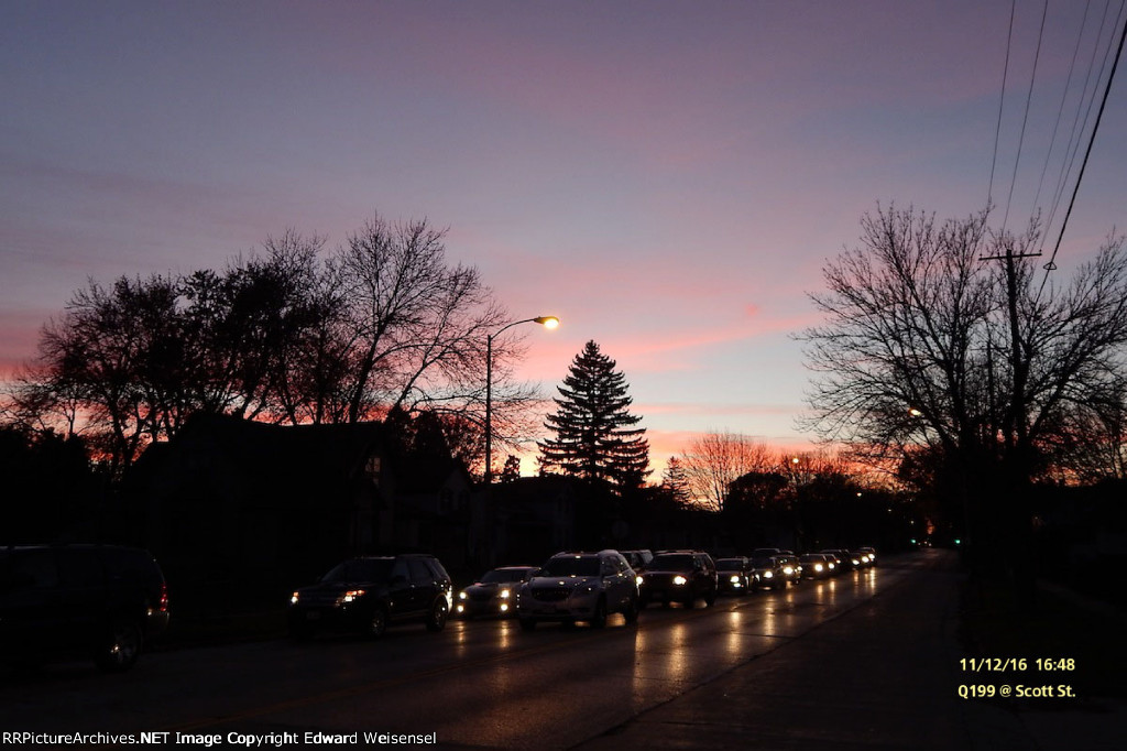 Q199 takes 11 minutes to roll into Shops at dusk